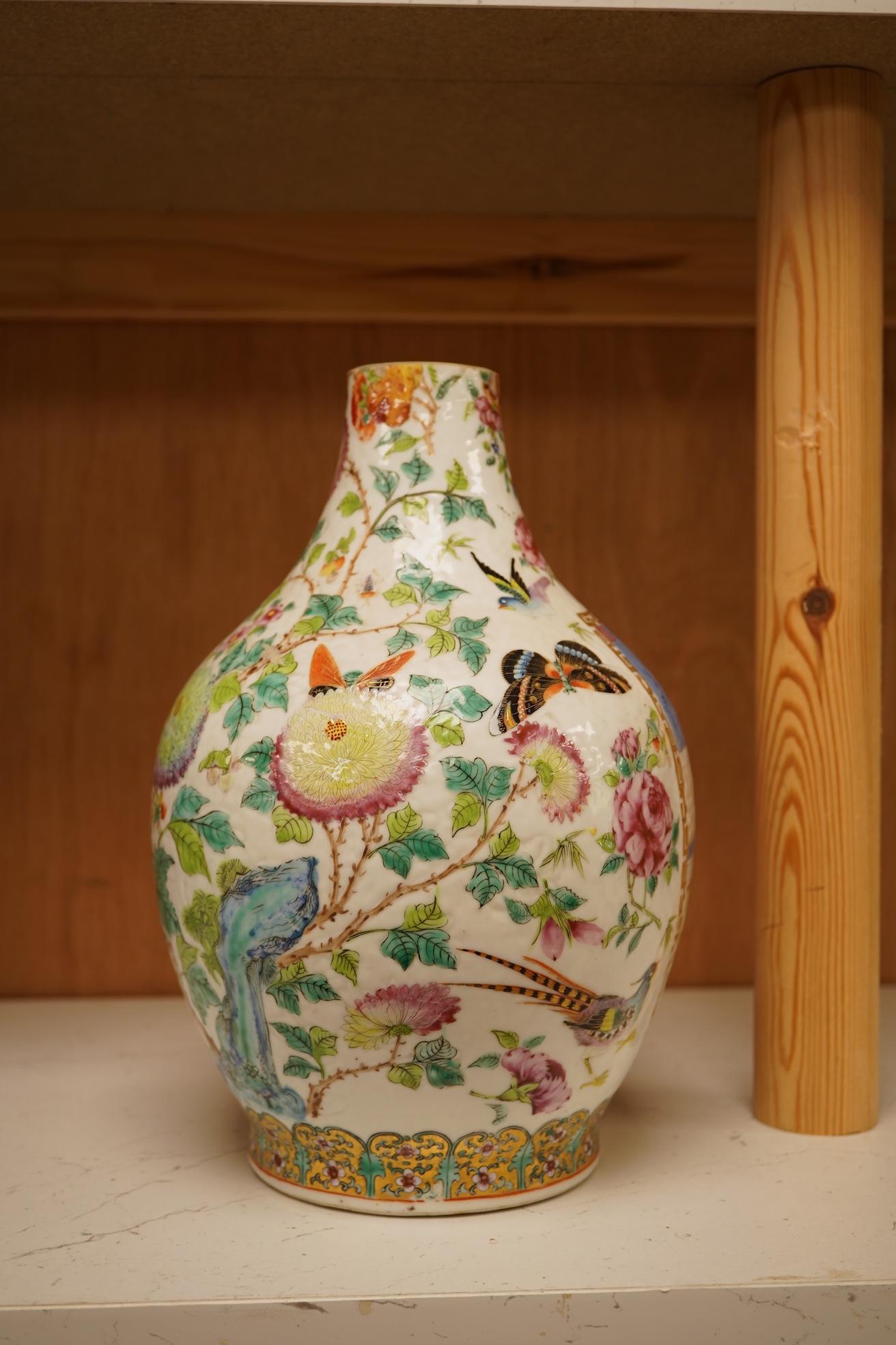 A 19th century Chinese famile rose vase, with an altered neck, 25cm high